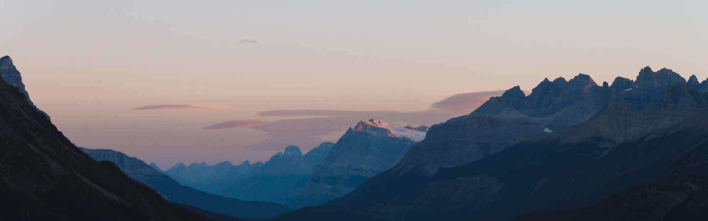 Sunset peeking through the mountains