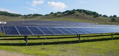 Solar farm and green hills