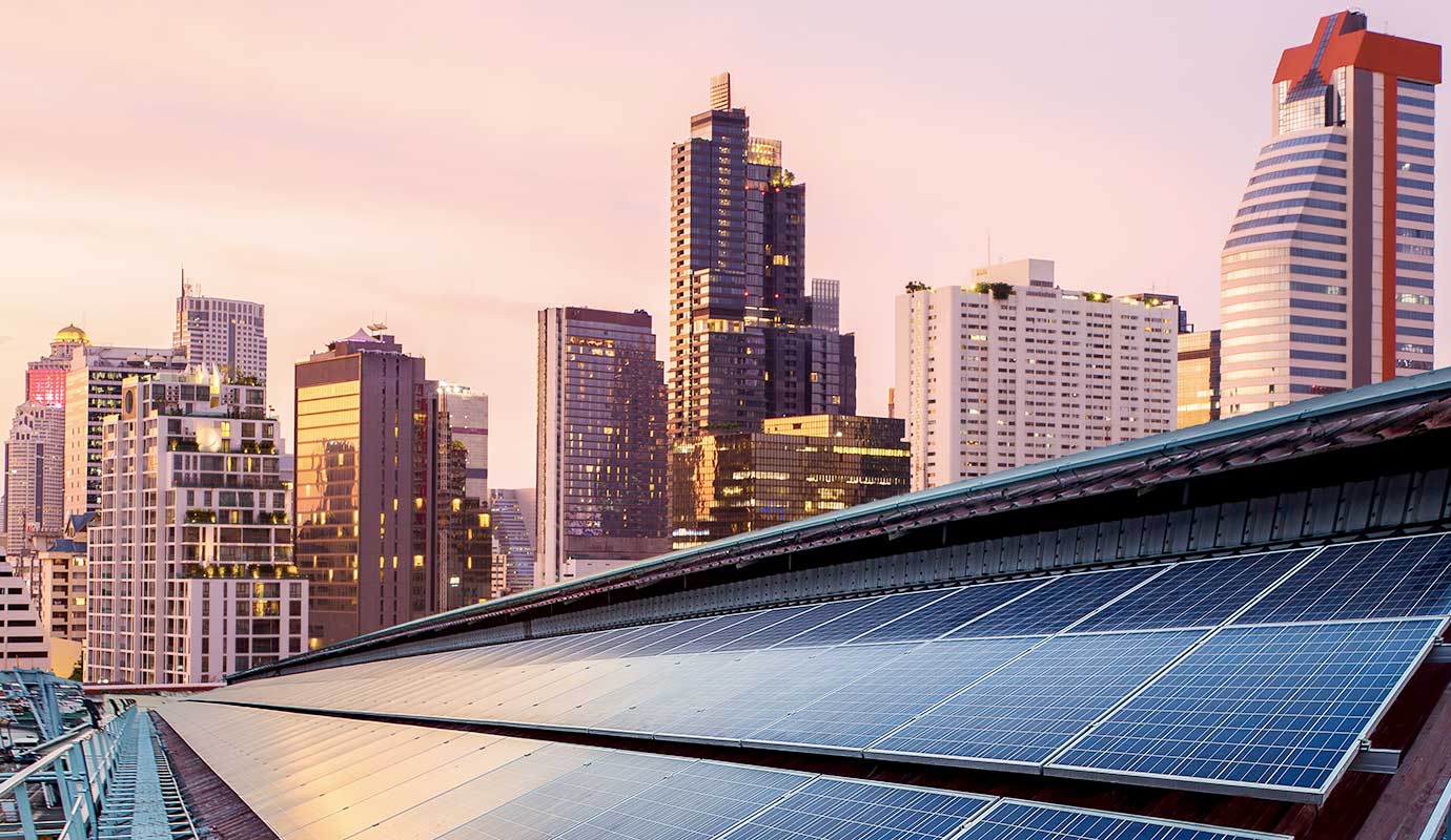 Solar panels in front of a skyline
