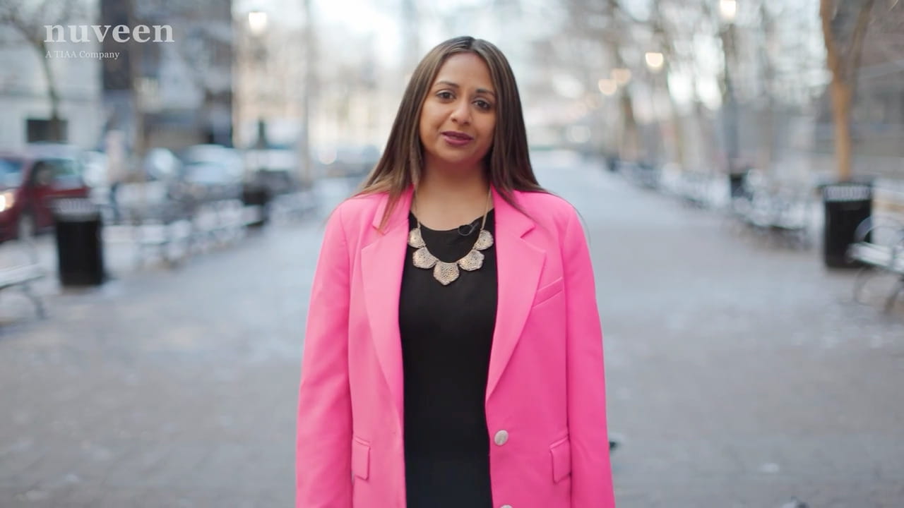 Woman in a pink blazer