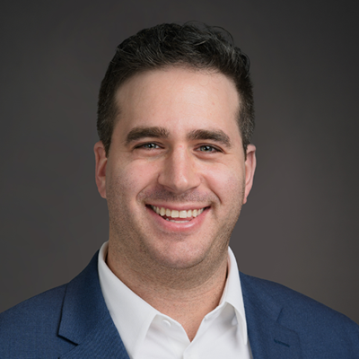 Person smiling for a portrait