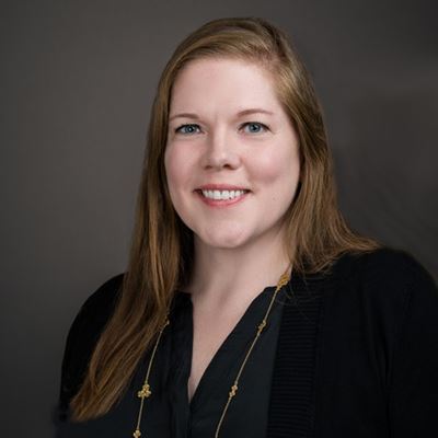 Person smiling for a portrait