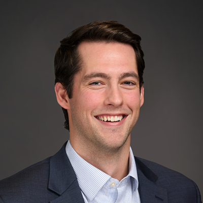 Person smiling for a portrait